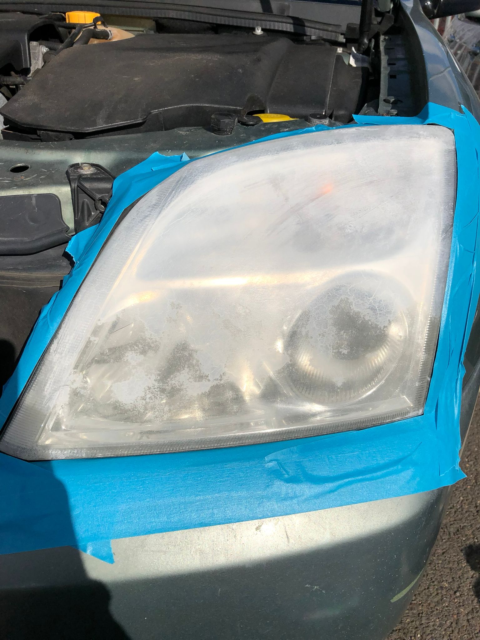 Oxidized headlight before restoration